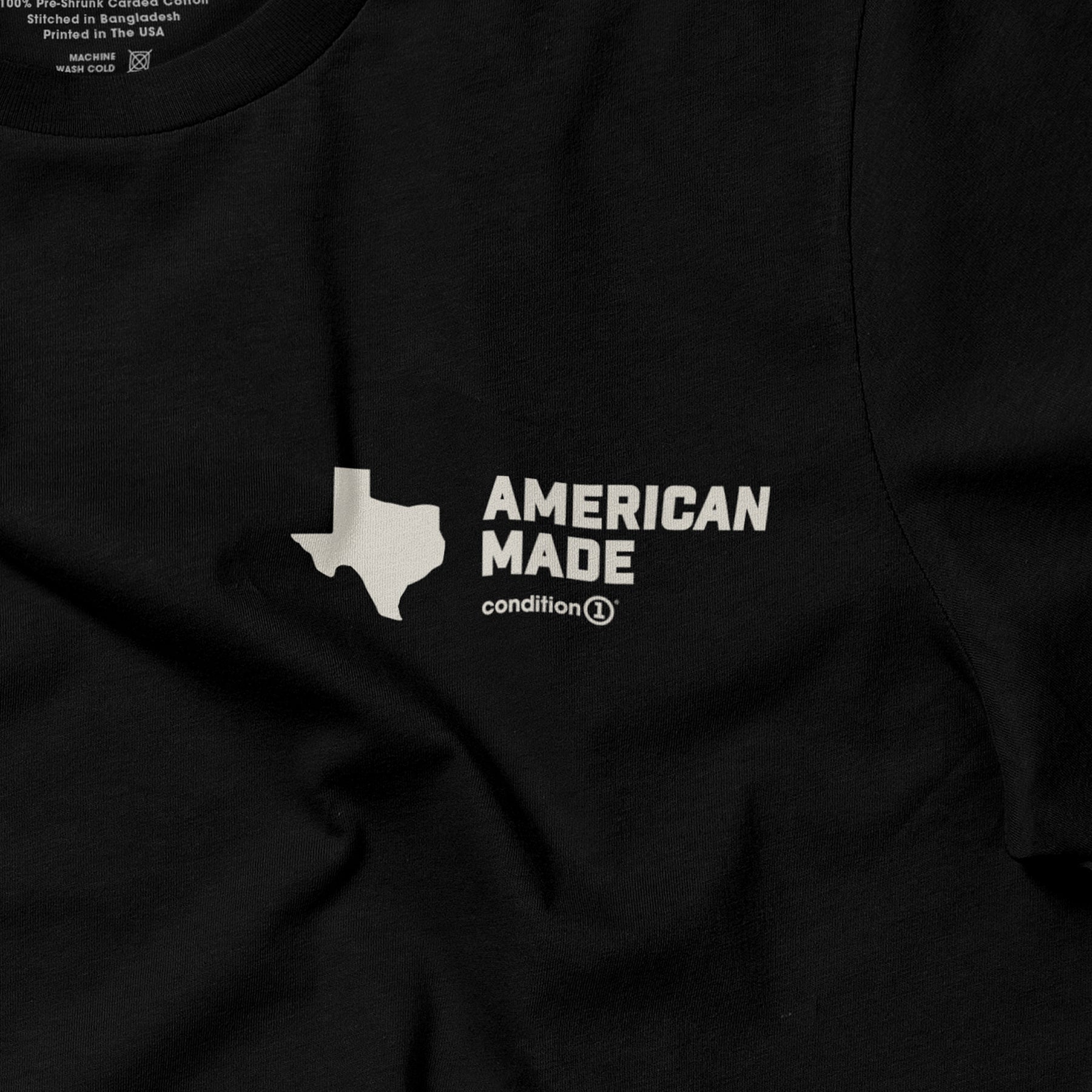 Black American-made T-shirt with a white graphic of Texas and the text "AMERICAN MADE" and "condition 1".