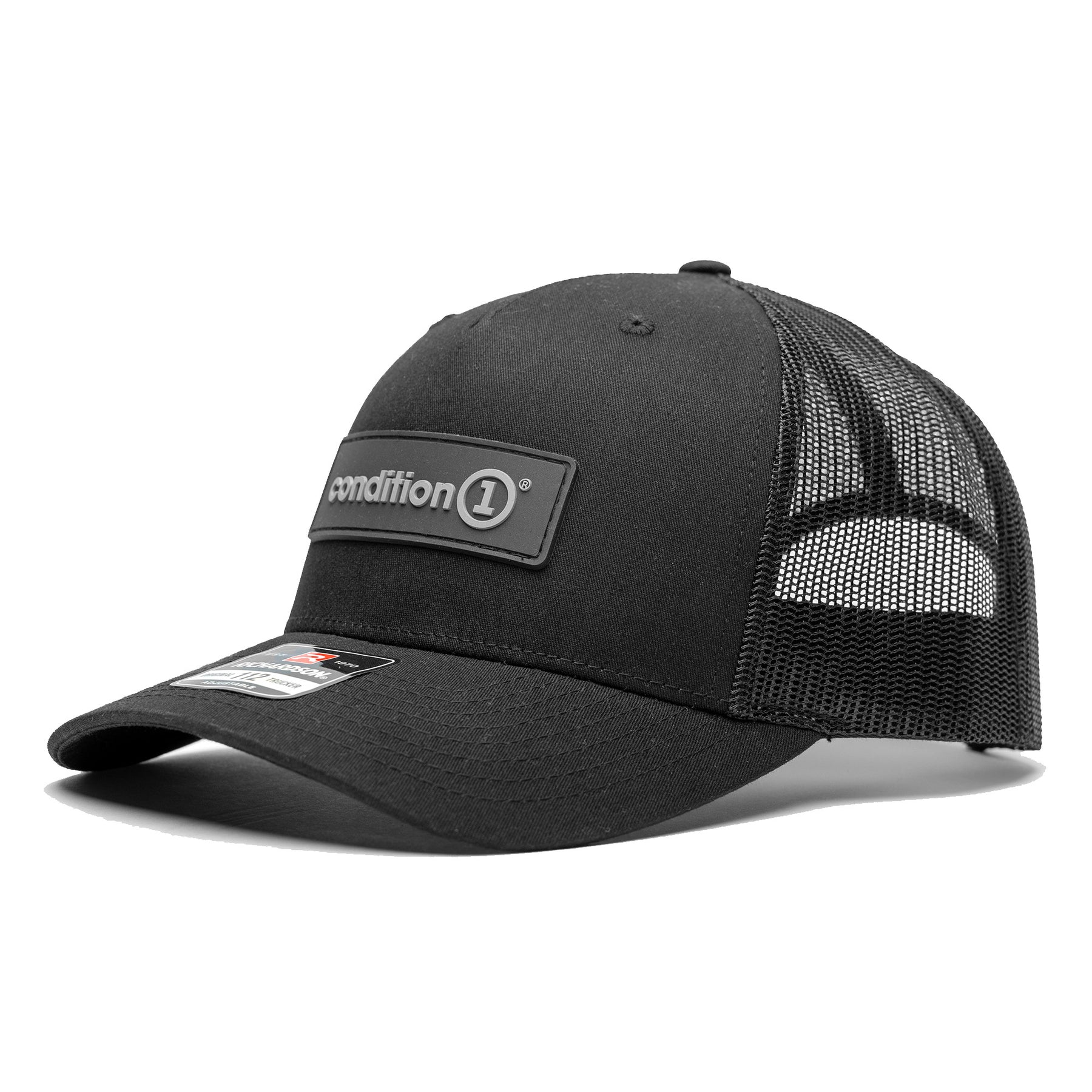 Black snapback cap with mesh back and a prominent Condition 1 logo patch on the front. Ideal for casual wear.
