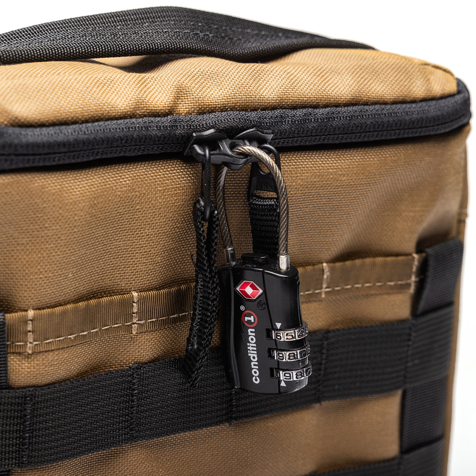 Brown and black Lone Star 2 pistol bag with a combination lock attached to the zipper. Durable, tactical-style gun storage case.