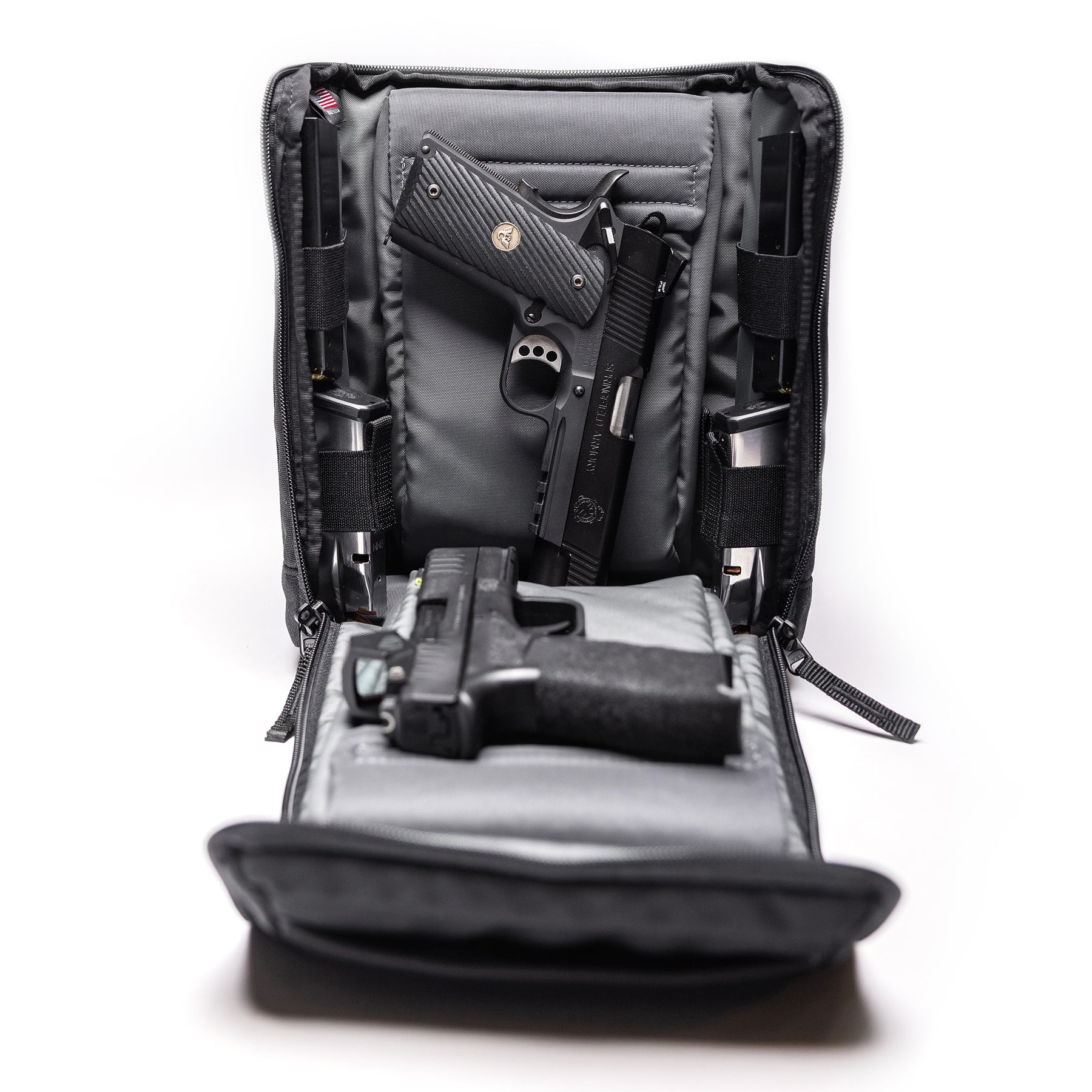 Open Lone Star 2 Pistol Bag with two handguns, magazines, and a semi-automatic pistol inside, designed for secure firearm storage.