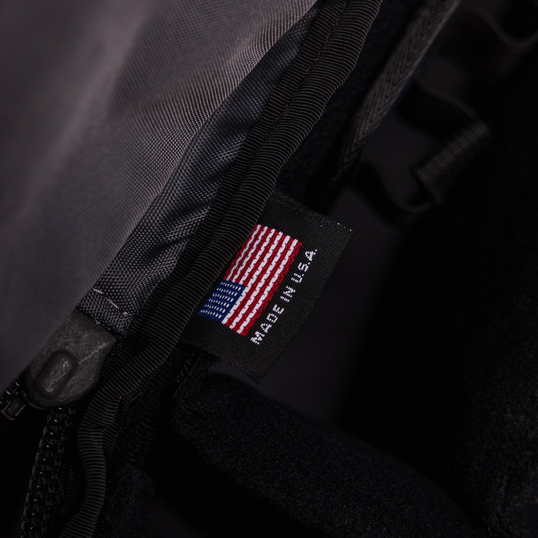 Close-up of the Lone Star Range Bag interior showing the "Made in USA" label with an American flag design.