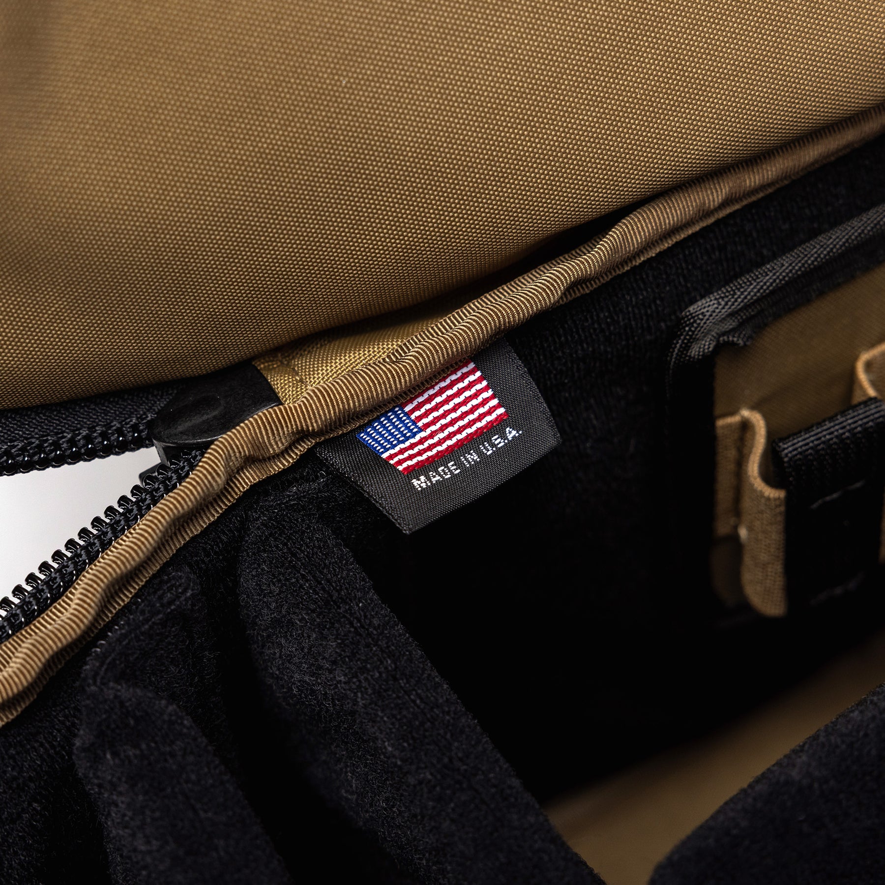 Lone Star Range Bag interior showing a tag with the American flag and "Made in USA" label. Durable fabric and spacious design.