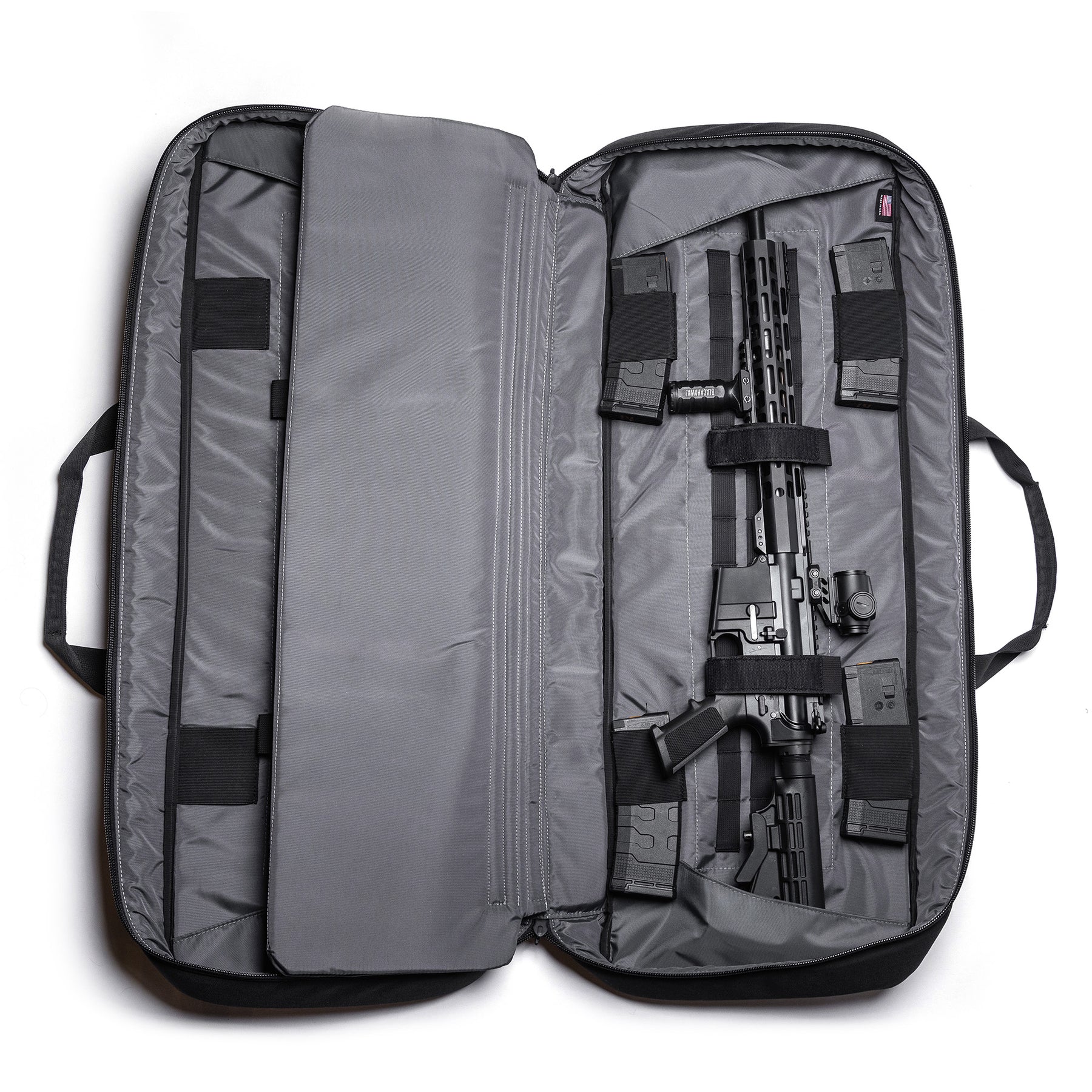 Gray Lone Star 36" rifle bag with padded compartments, straps, and storage for firearm and accessories.