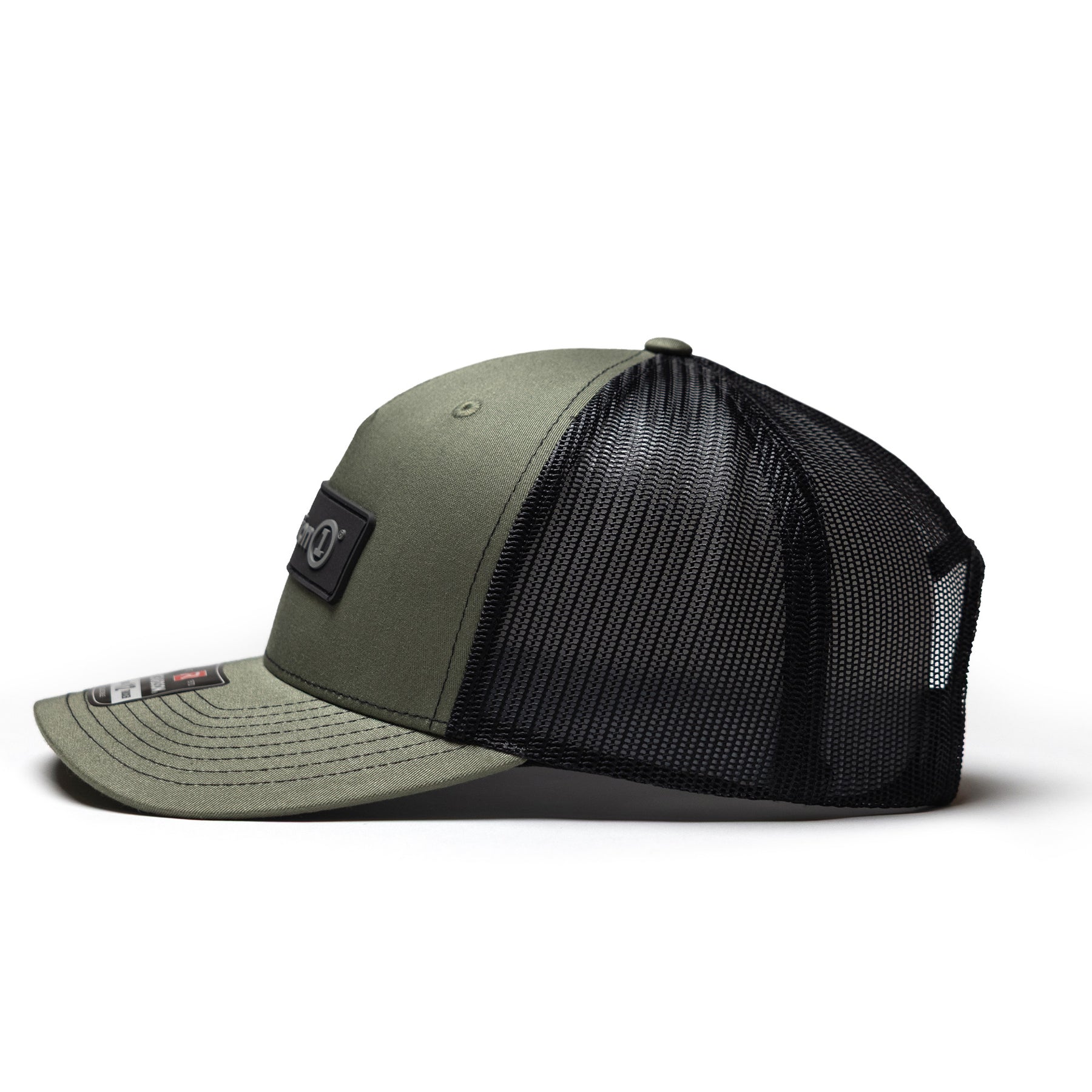 Olive green snapback cap with a black mesh back and a rectangular logo patch on the front, featuring a curved brim and adjustable strap.