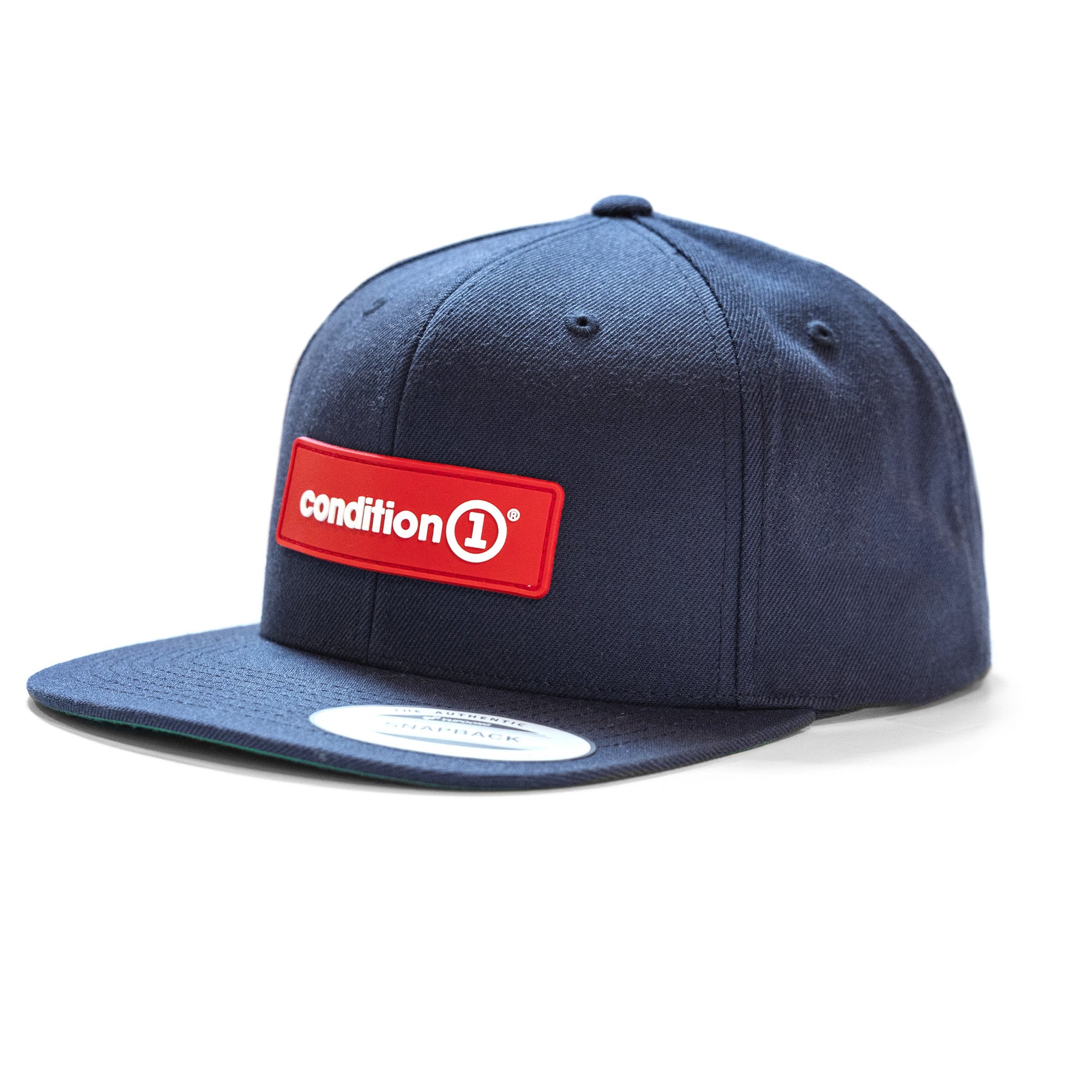 Black snapback cap with a red rectangular patch that reads "condition 1" on the front, featuring a flat brim and adjustable strap.
