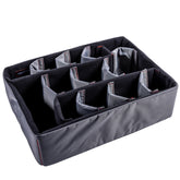 Padded divider set with adjustable compartments for organizing items inside the #253 case, featuring black and gray fabric.