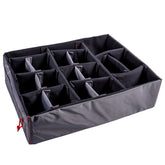 Padded divider set with adjustable compartments for organizing items in the #839 case, featuring black fabric and red stitching.