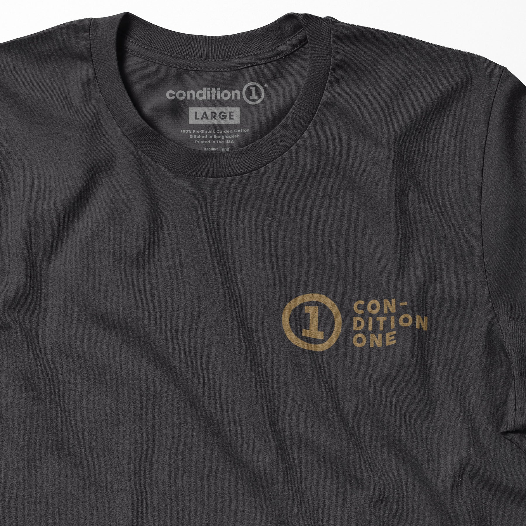 Black T-shirt with "Condition One" logo and text printed in gold on the front, featuring a round emblem with the number 1.