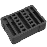 Black foam insert with four pre-cut slots for organizing tools or components in case #179.