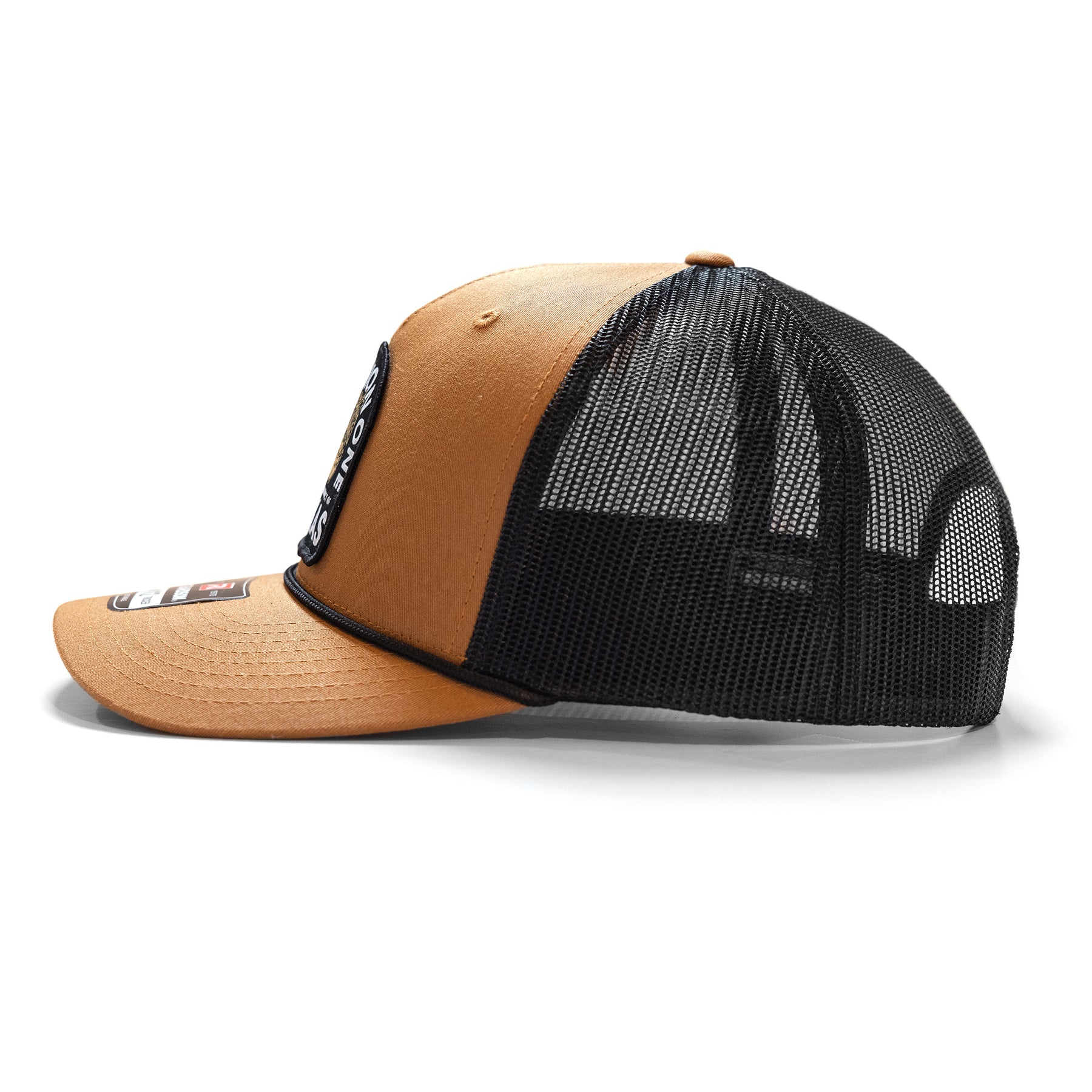 Brown and black snapback hat with "Texas Badass" embroidered patch, mesh back panels, and curved brim.