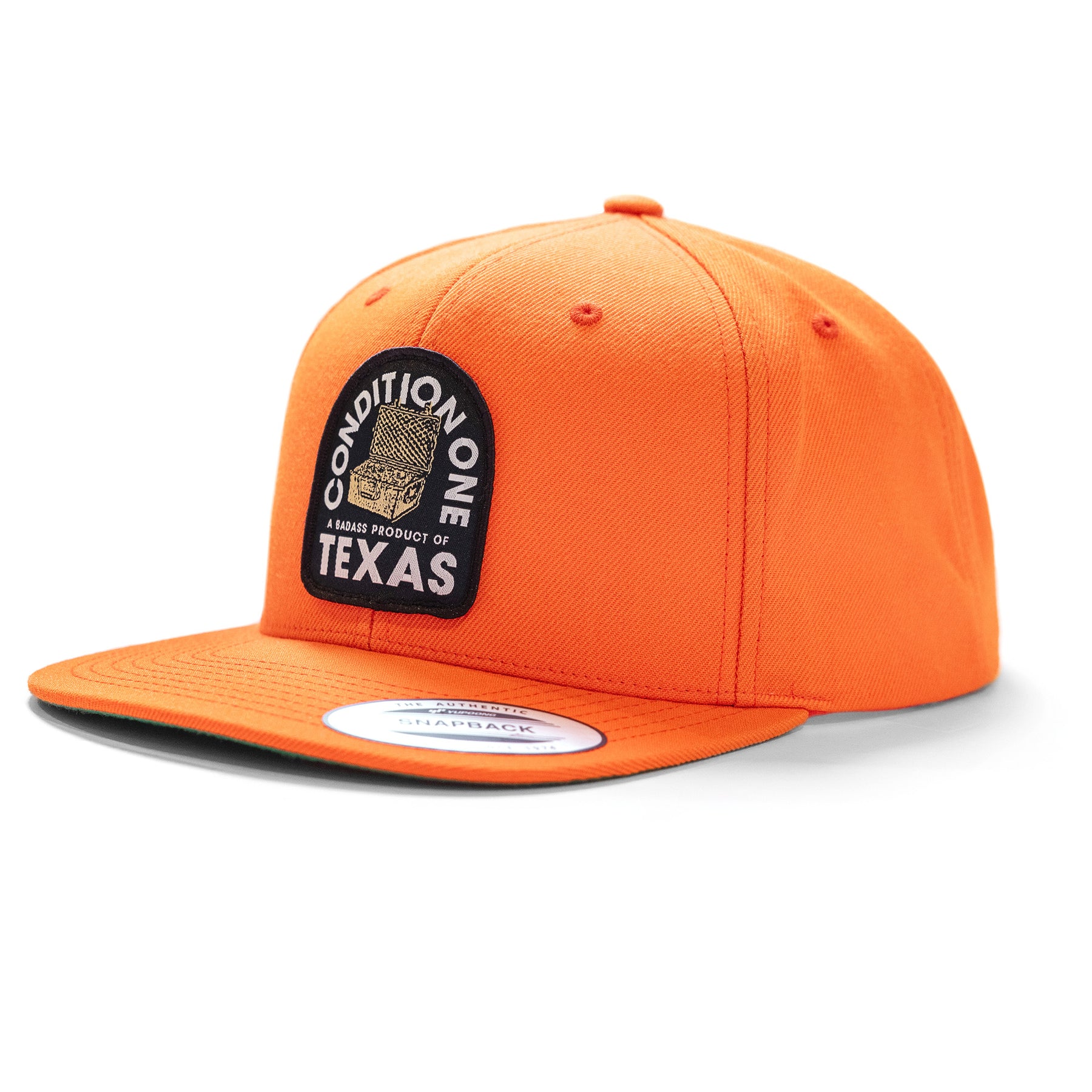 Orange snapback hat with "Texas Badass Hunter" patch, featuring a rugged design and curved brim.
