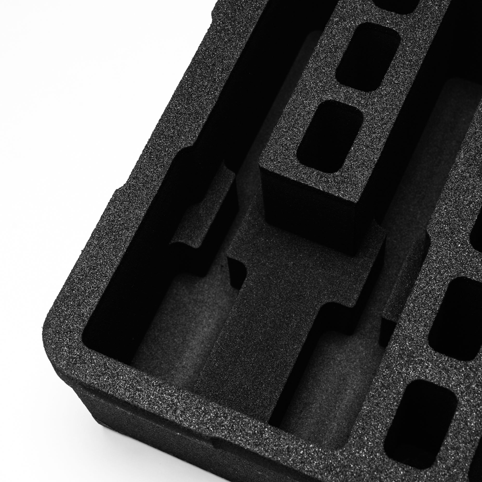Pre-cut foam insert for #179 case, designed to securely hold 8 magazines and two additional slots for accessories.
