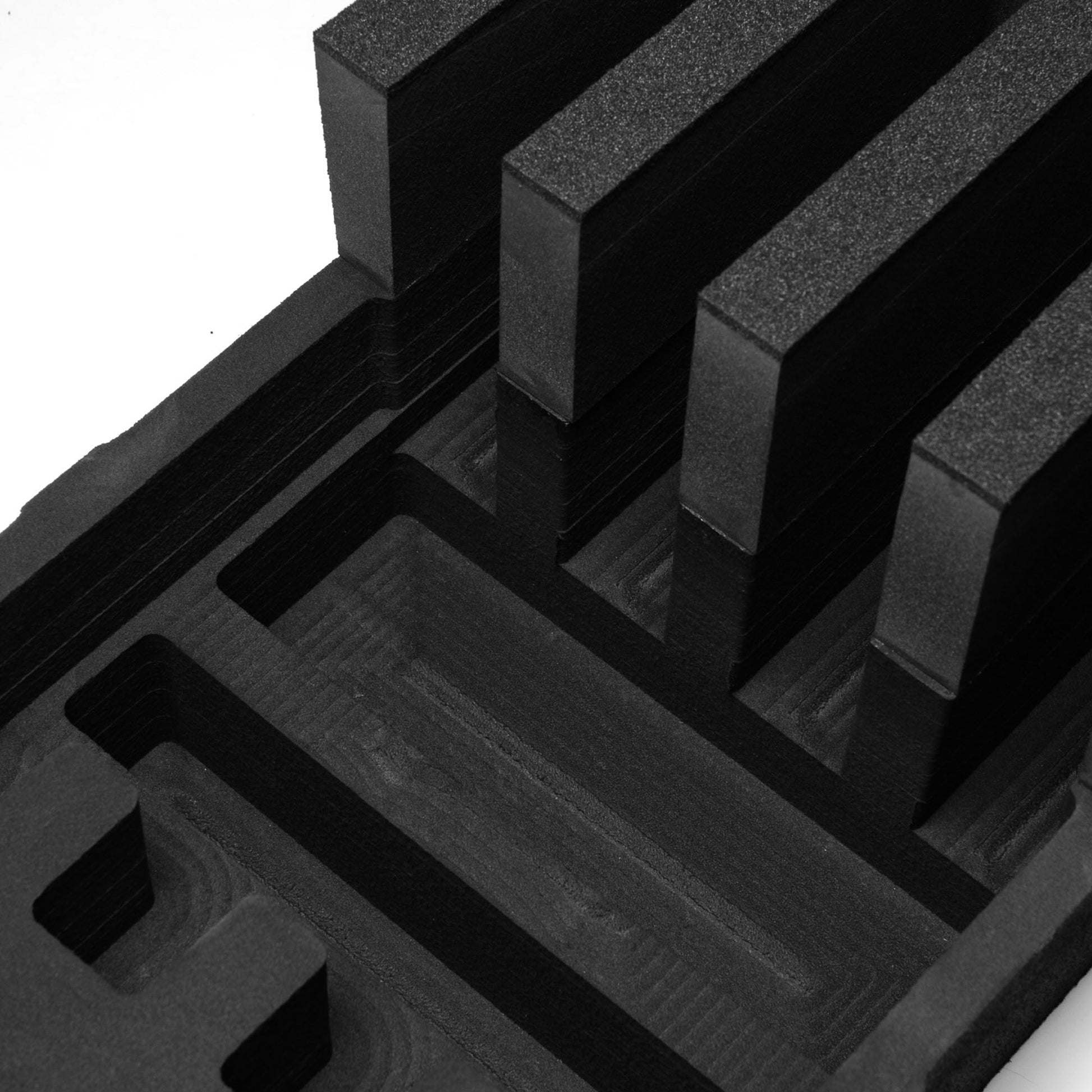 Pre-cut foam insert for 4-slot tactical rifle storage in #2191 hard case, designed for secure and organized gear protection.