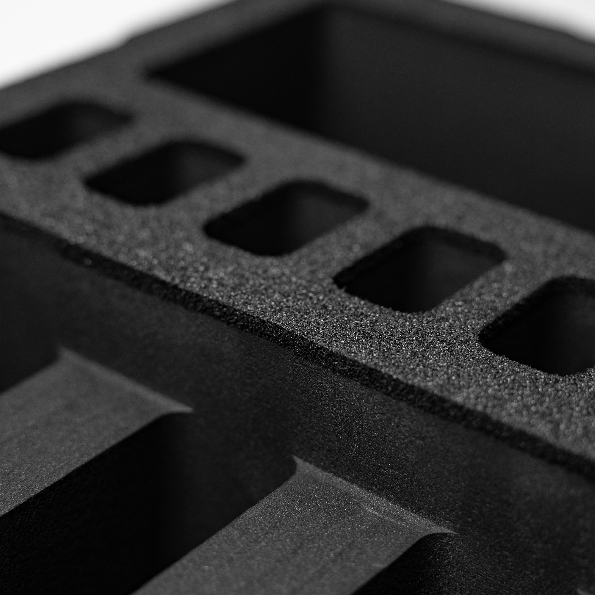 Pre-cut foam insert for #300 case, designed to securely hold 4 slots and 8 magazines for optimal organization and protection.