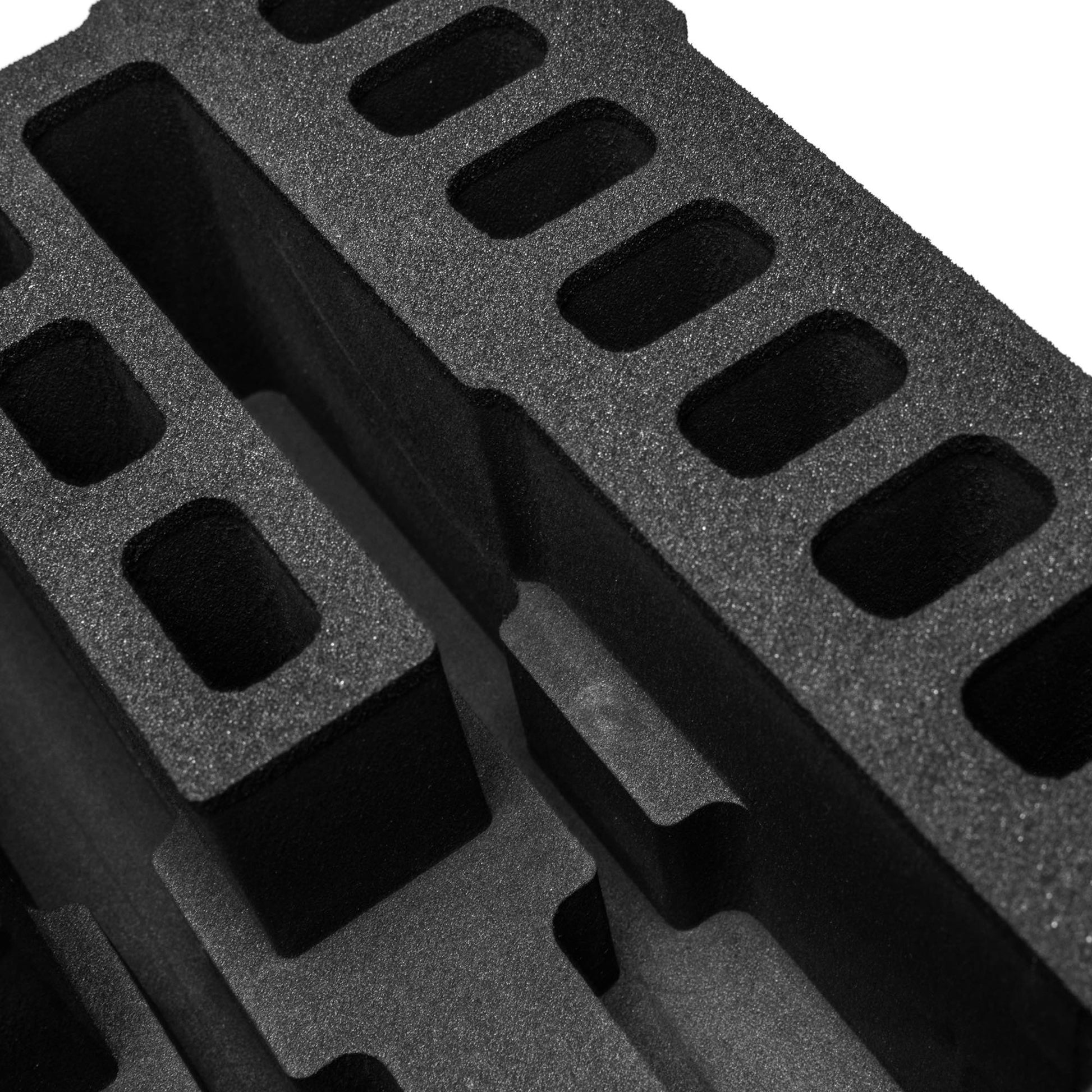 Pre-cut foam insert designed for #801 case, featuring five slots for items and twenty magazine compartments for secure storage.
