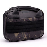 Kinetic 2 Pistol Bag featuring a durable camo design, padded handles, and modular attachment points for secure transport.