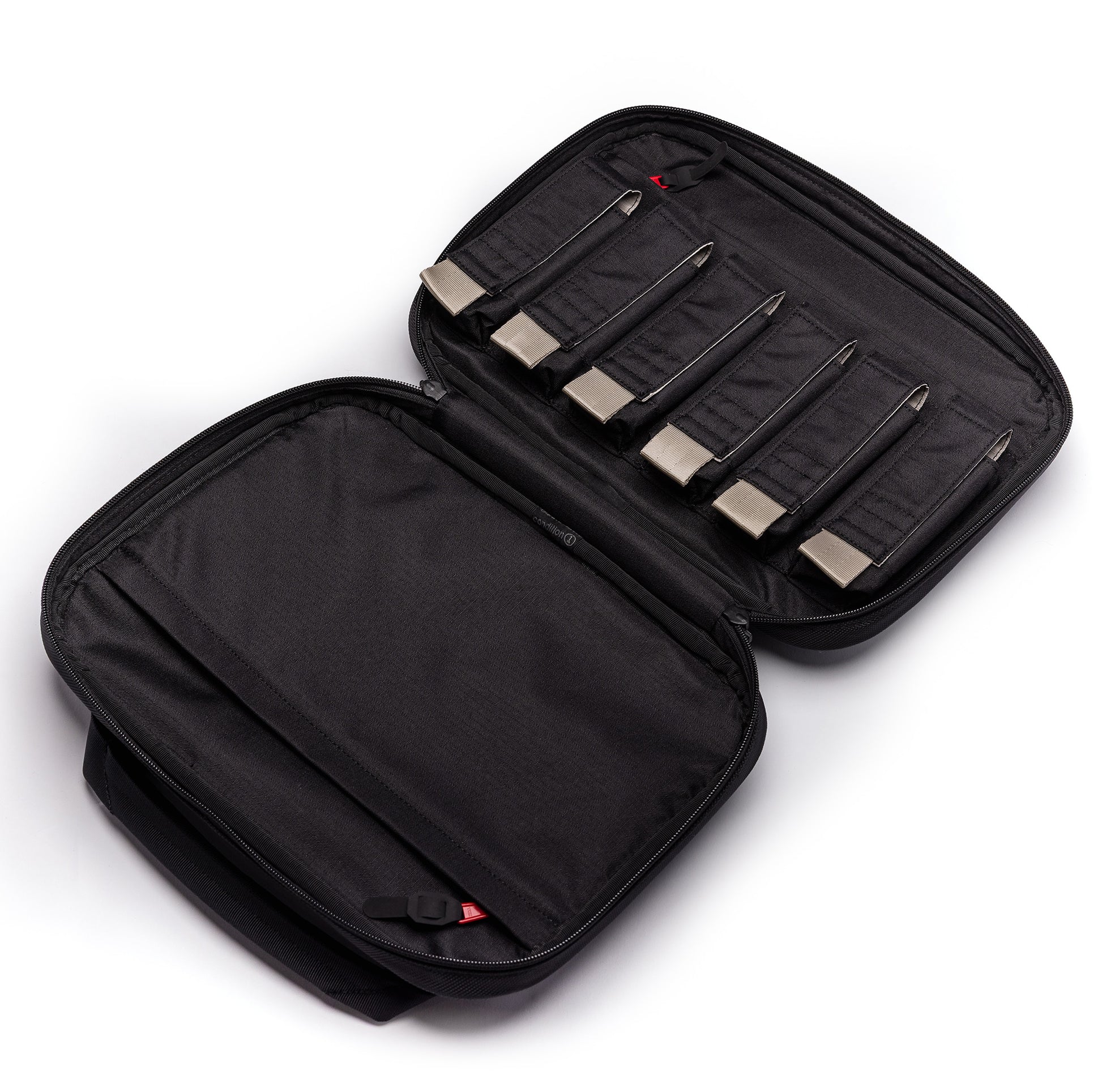Kinetic 2 Pistol Bag open, featuring compartments for six magazines and a durable black exterior for secure storage.