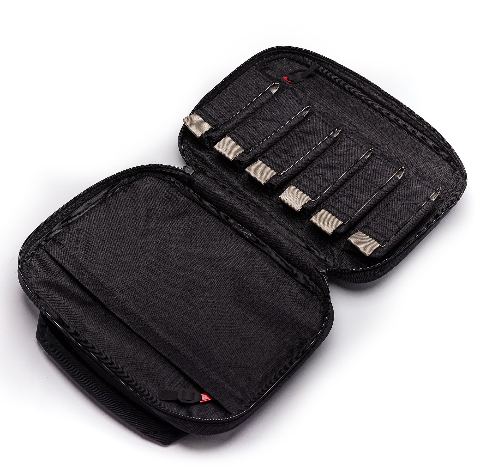 Kinetic 2 Pistol Bag open, featuring compartments for six magazines and a durable black exterior for secure storage.