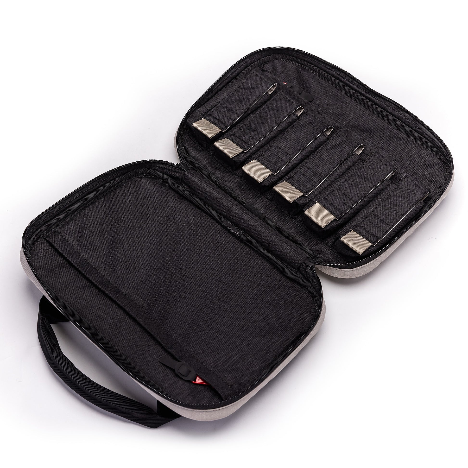 Kinetic 2 Pistol Bag with an open design, featuring compartments for storing two pistols and five magazines securely.
