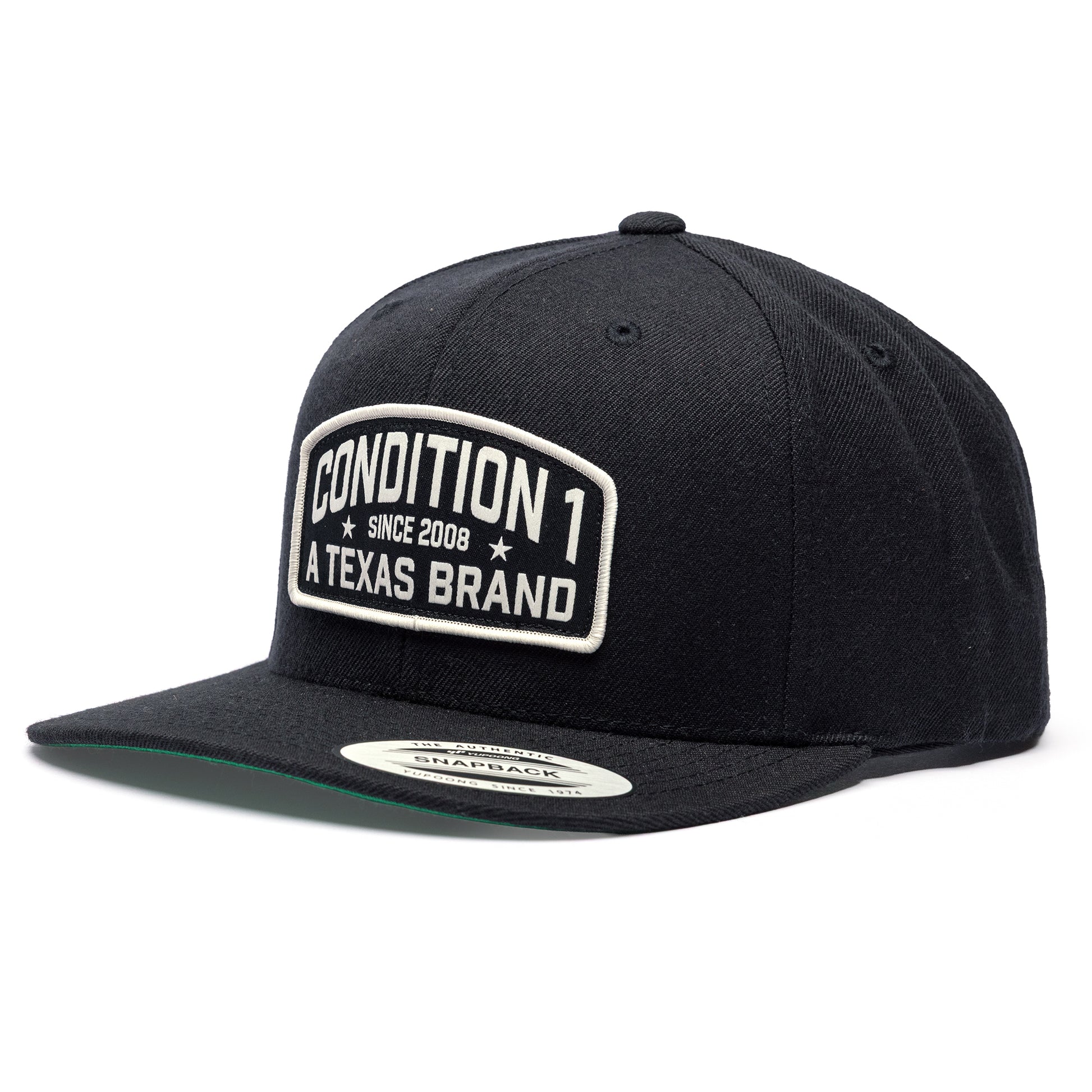 Black Texas Brand snapback hat featuring a white embroidered patch with "Condition 1 Since 2008" on the front.