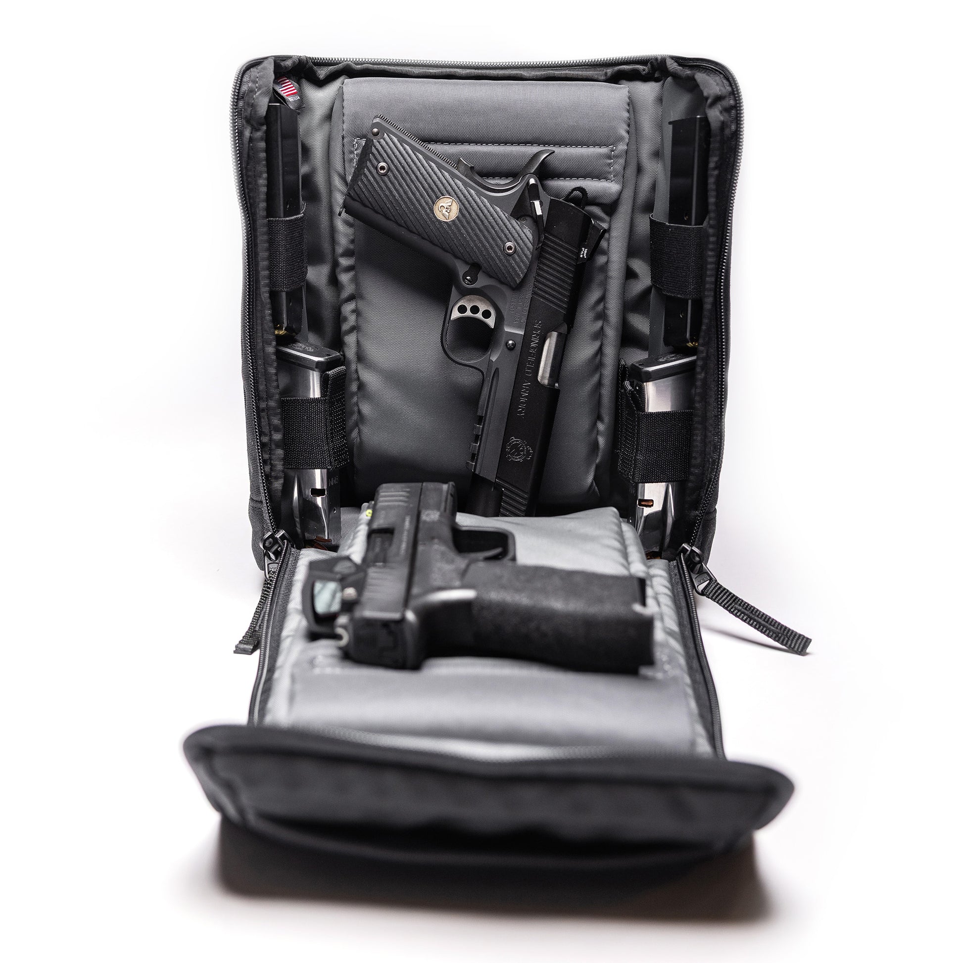 Open Lone Star 2 Pistol Bag with two handguns, magazines, and a semi-automatic pistol inside, designed for secure firearm storage.