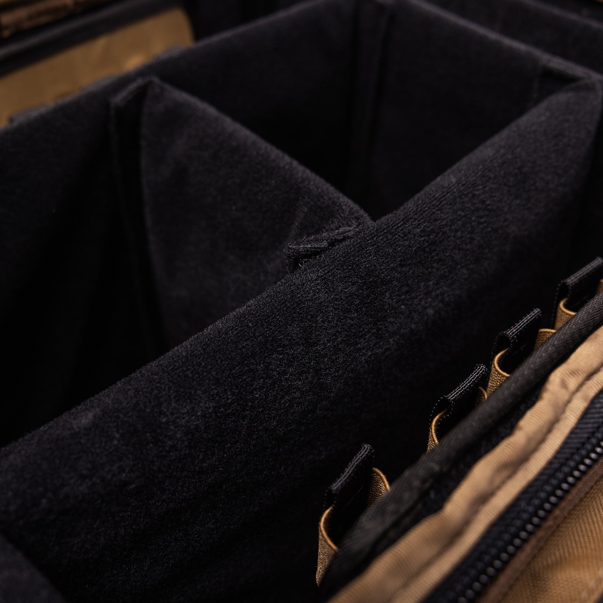 Interior view of the Lone Star Range Bag, featuring multiple padded compartments for organized storage of gear.