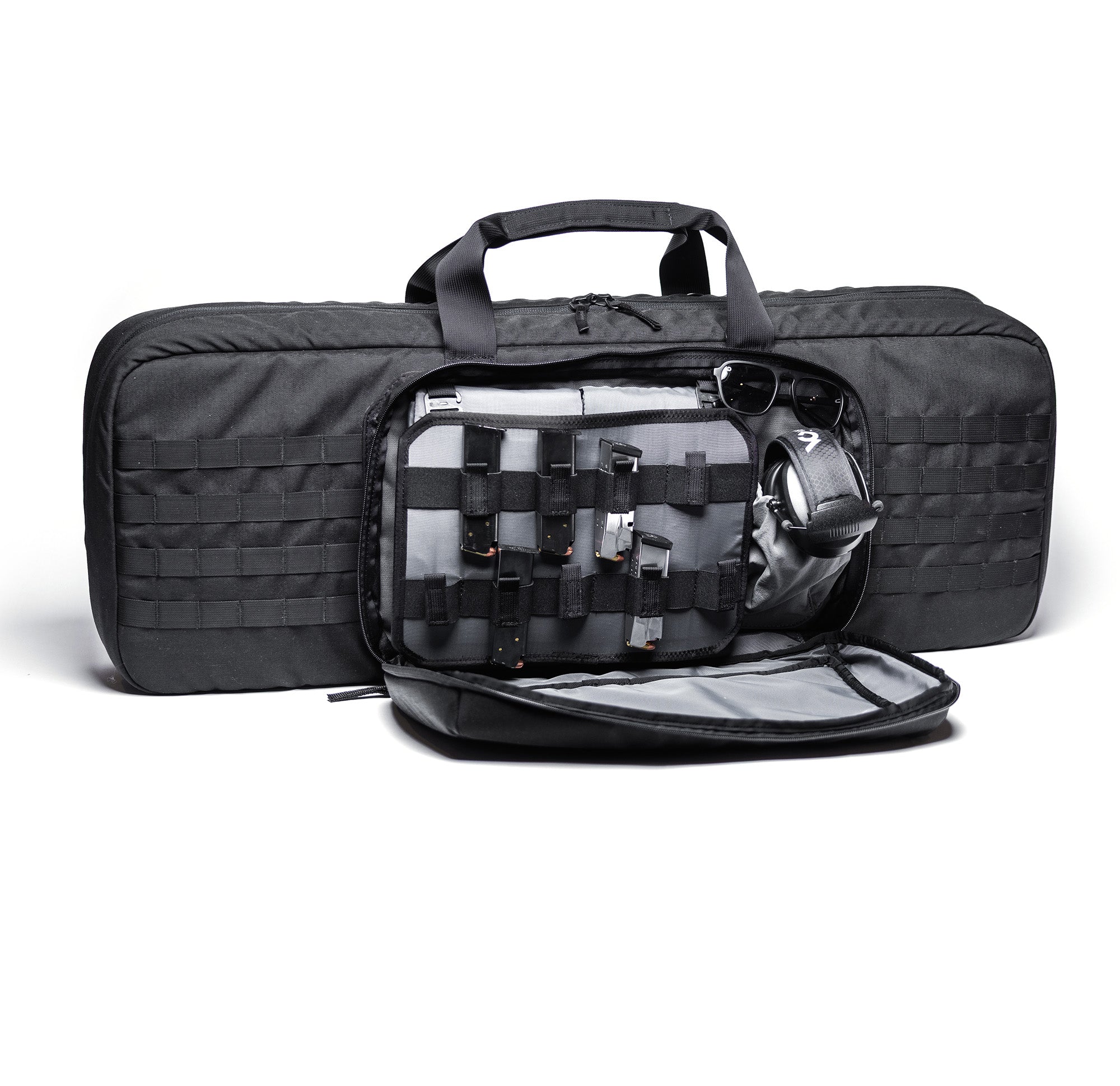 Black Lone Star 36" rifle bag with multiple compartments, MOLLE webbing, and accessories including sunglasses, ear protection, and magazines.