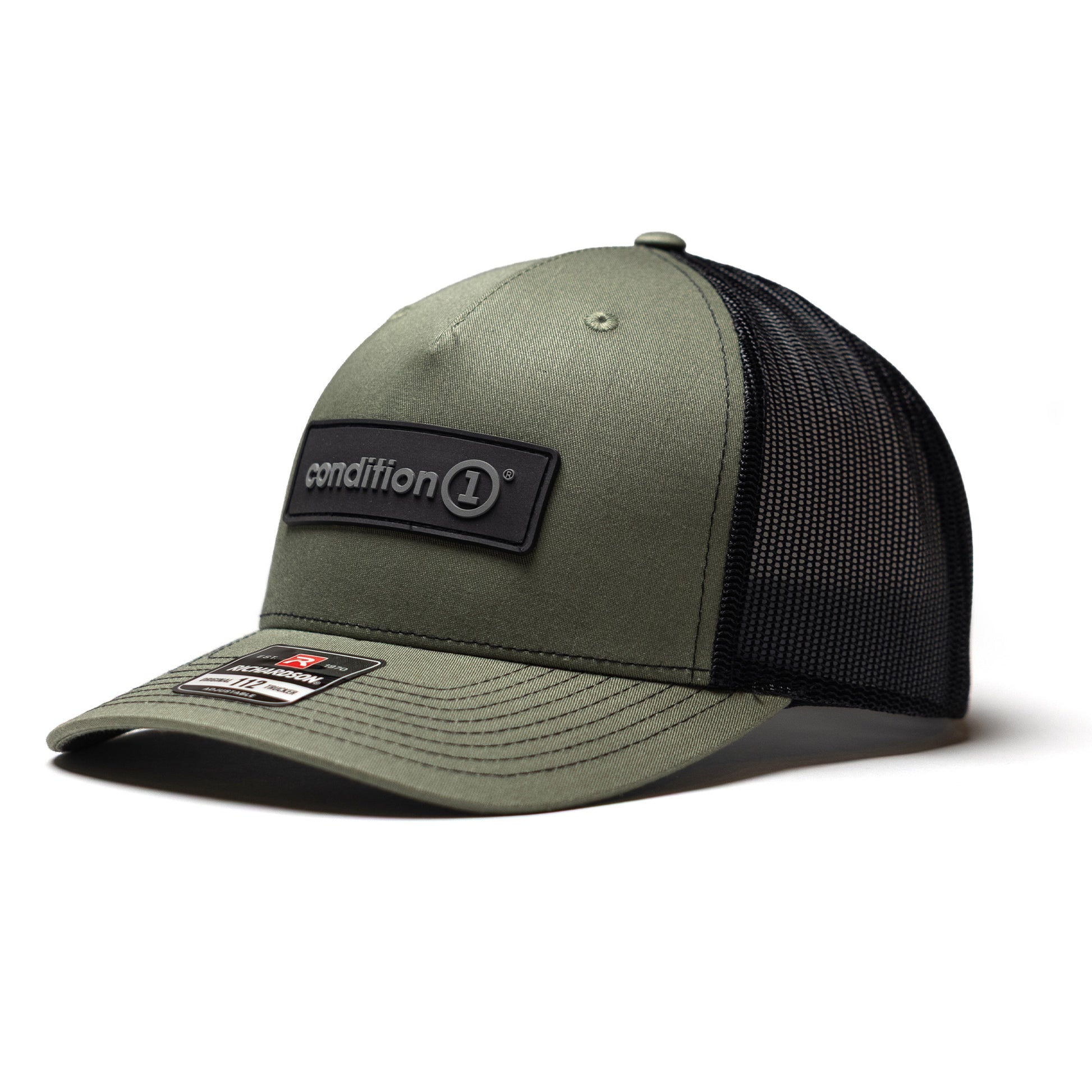 Olive green snapback cap with black mesh back, featuring a rubber patch with "condition 1" logo on the front.