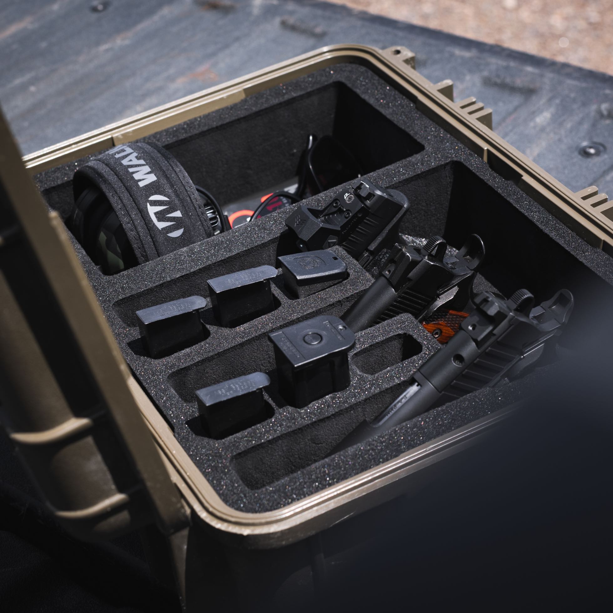 Pre-cut foam insert for #179 case, featuring three slots for firearms and six magazine compartments for secure storage.