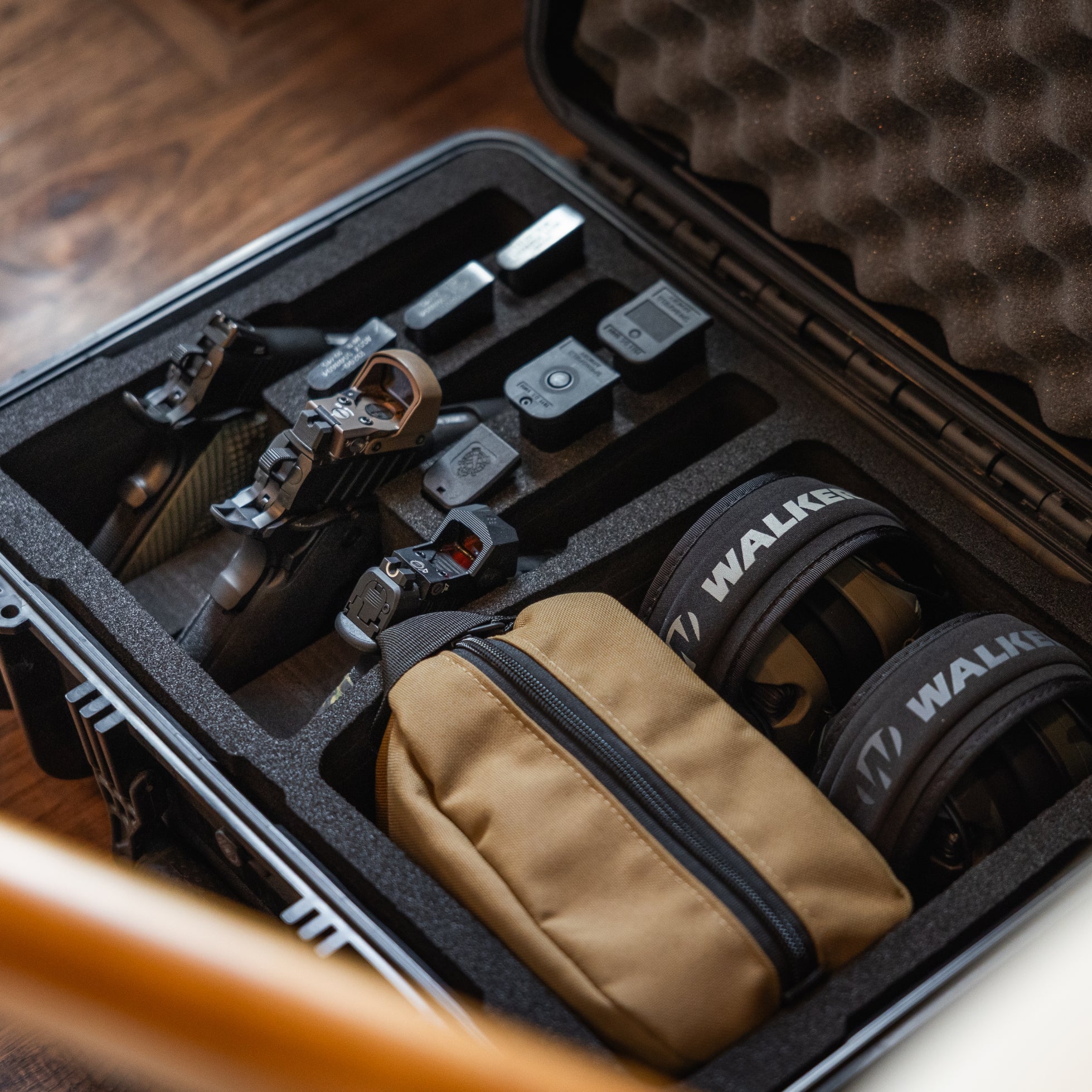 Pre-cut foam insert for #801 case, featuring slots for 3 handguns and 6 magazines, ensuring secure storage and transport.