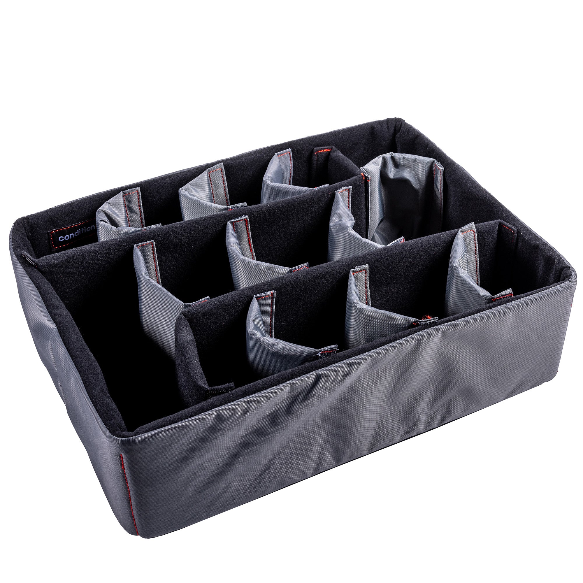 Padded divider set with adjustable compartments for organizing items inside the #253 case, featuring black and gray fabric.