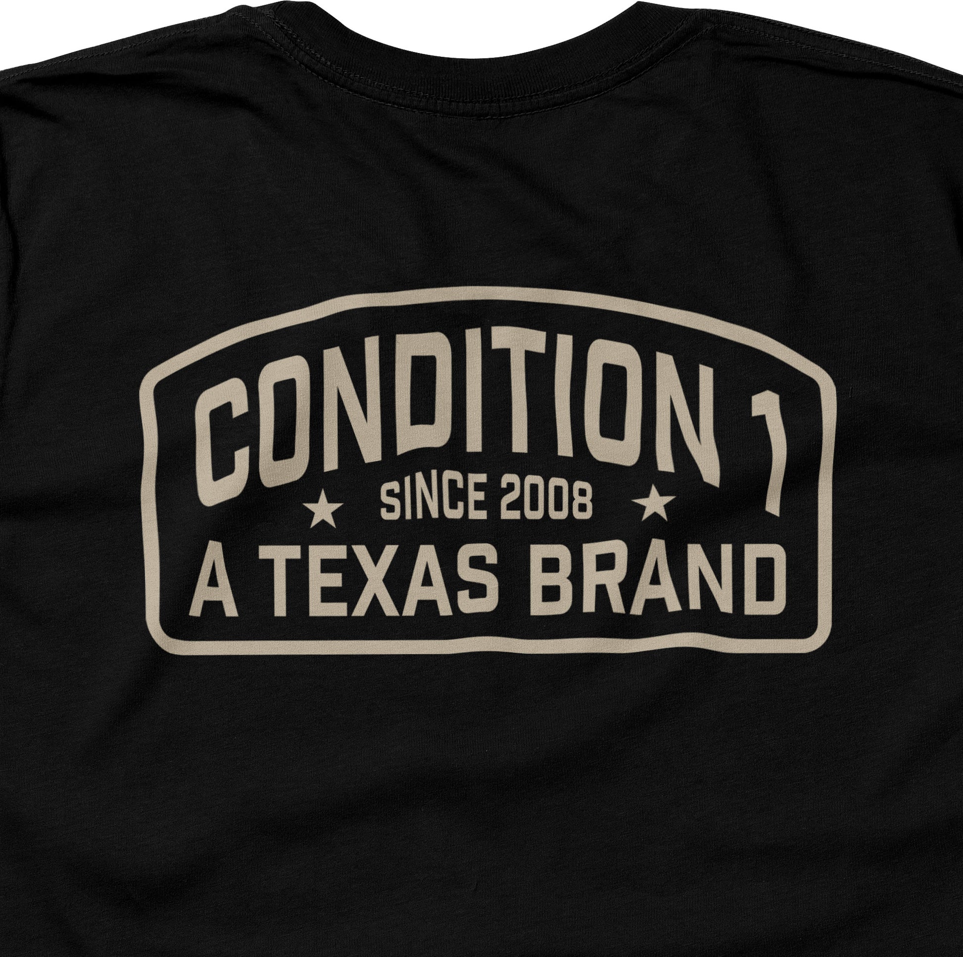 Black t-shirt featuring a bold graphic that reads "Condition 1 Since 2008 A Texas Brand" on the back.