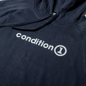 Black hoodie featuring the "condition 1" logo prominently displayed in white across the chest.