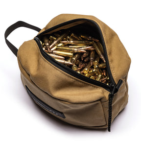 Lone Star Ammo Bag filled with ammunition, featuring a durable design and a zippered opening for easy access.