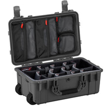 Open 22" large black protective case with foam compartments inside and organized zippered mesh pouches on the lid.