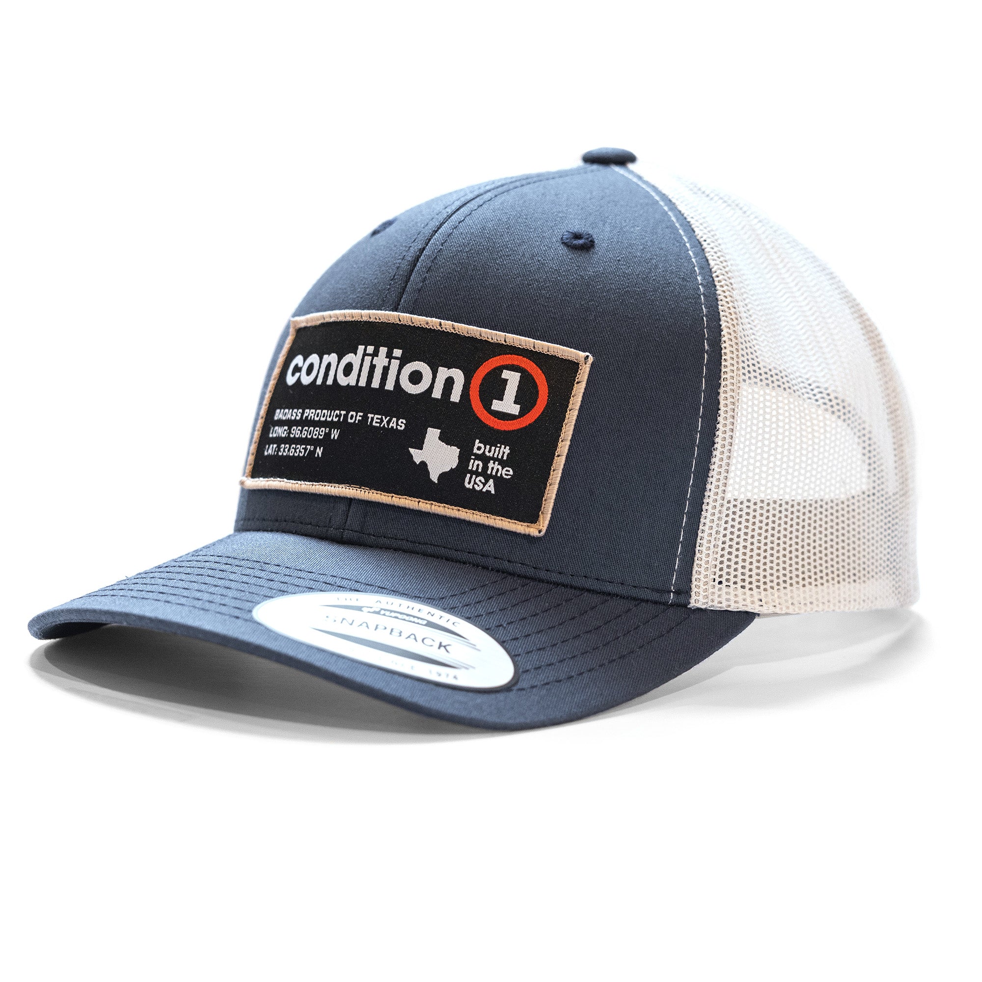 The Label - Snapback cap features a navy front, beige mesh back, and a patch with "condition 1" branding and Texas map.